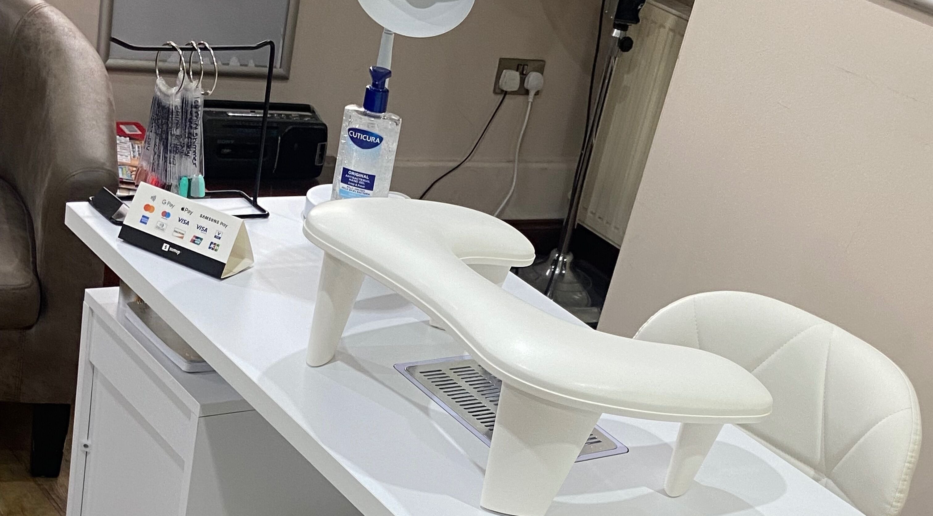 Sleek manicure station at Nails By Ava, Bridgwater, England, GB displaying tools and products.