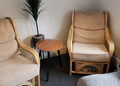 Inviting wicker chairs in Life Story Coach By Jenni, offering a cozy space in Birmingham, England, GB.