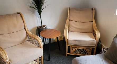 Inviting wicker chairs in Life Story Coach By Jenni, offering a cozy space in Birmingham, England, GB.
