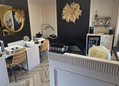 Elegant and cozy interior of Alana Fores Nails and Makeup in Shawforth, England, GB showcasing modern nail and makeup stations.