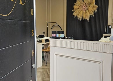 Entrance view of Alana Fores Nails and Makeup in Shawforth, England, GB with elegant interior decor.