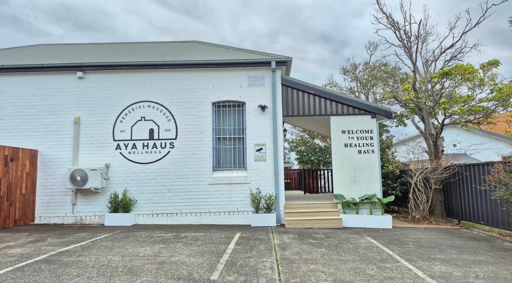 Entrance of Aya Haus Massage & Day Spa in Shellharbour, New South Wales, AU, showcasing welcoming facade.