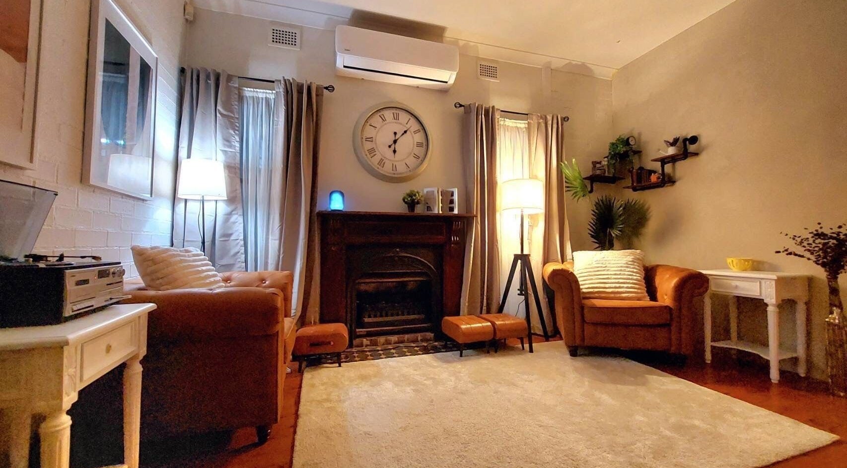 Relaxing lounge area at Aya Haus Massage & Day Spa, Shellharbour, New South Wales, AU with plush chairs and decor.