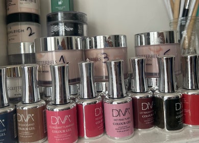 Diverse nail polishes at Luxe Beauty Lounge, Coventry, England, GB showcasing vibrant beauty options.