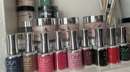 Diverse nail polishes at Luxe Beauty Lounge, Coventry, England, GB showcasing vibrant beauty options.