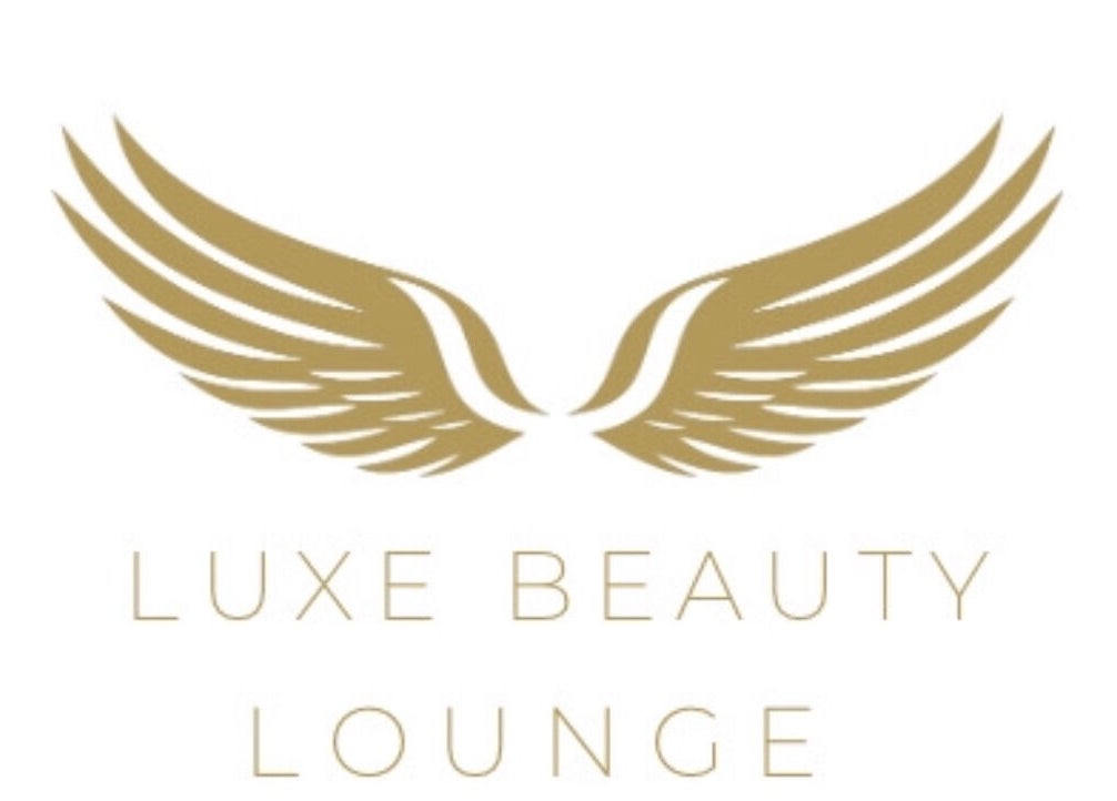 Golden wing logo of Luxe Beauty Lounge in Coventry, England, GB.