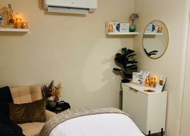 Cozy wellness room at Beautique Smiles, Dunlop, ACT, AU with stylish decor and ambient lighting.