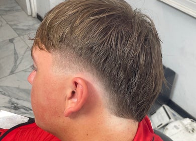 Close-up of a stylish fade haircut at trimgudbyhadi in Luton, England, GB.