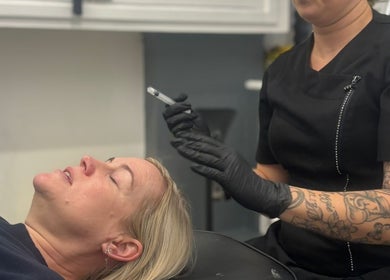 Professional beauty treatment at Amorè Beauty, Baldock, England, GB. Client receiving specialized care.