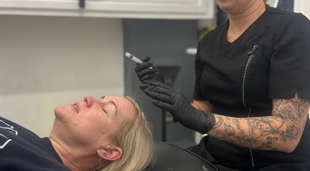 Professional beauty treatment at Amorè Beauty, Baldock, England, GB. Client receiving specialized care.