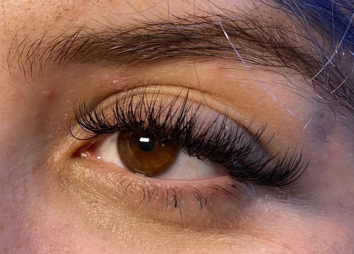Close-up of eyelash extensions by Lash’d by Summer in Bebington, England, GB showcasing beauty and precision.