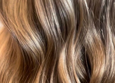 Close-up of highlighted hair styled at Hair by Alisha -Pine Grove in Pine Grove, California, US.