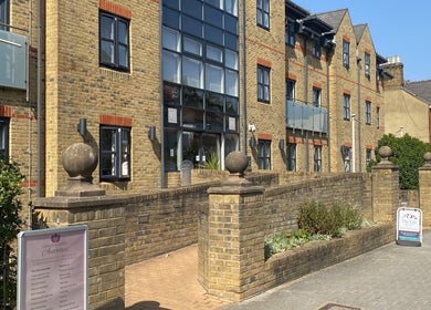 Exterior of London & Surrey Aesthetics clinic in London, England, GB showcasing modern brick design.