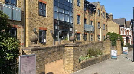 Exterior of London & Surrey Aesthetics clinic in London, England, GB showcasing modern brick design.