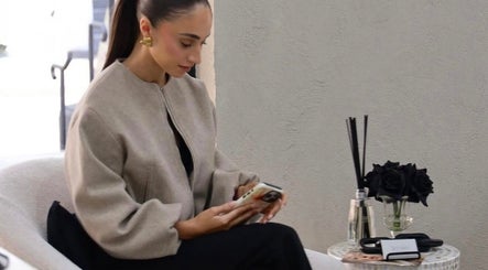Calm woman at Maryané Beauté in Darlinghurst, New South Wales, AU enjoying serene ambiance.