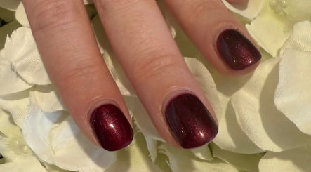 Stylish burgundy manicure at Aurora Beauty Studio, Newton Poppleford, England, GB.