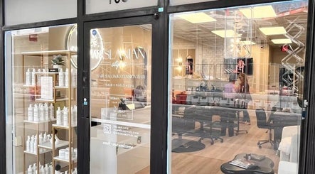 Front view of Aslanian Styles, a chic beauty salon in South Miami, Florida, US, showcasing modern decor and products.