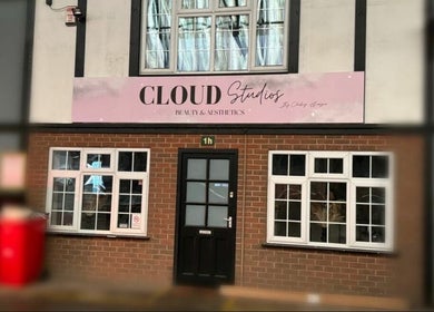 Front view of Charmed beauty studio in Stafford, England, GB with elegant signage and windows.
