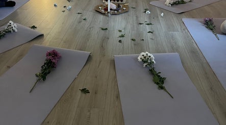 Tranquil yoga mats with flowers arranged at EyeAmHealing, Wolverhampton, England, GB.