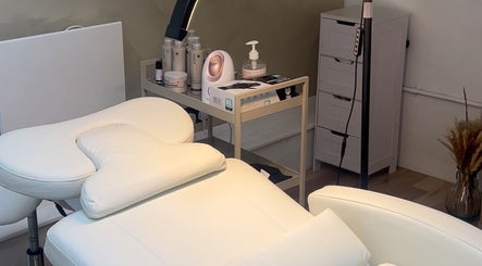 Serene treatment room at ūme, featuring a white massage table in London, England, GB.