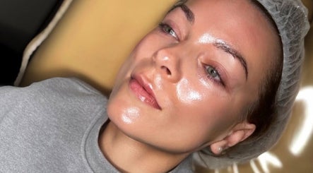 Client with glowing skin at Kr House Of Aesthetics, Dundee, Scotland, GB, showcasing a premium facial treatment.