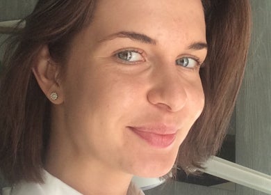 Smiling staff member at Cambridge Beautician. Romsey Town, Cambridge, England, GB.