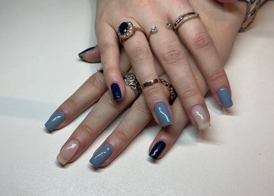 Stylish manicure with blue and nude tones at Cambridge Beautician. Romsey Town, Cambridge, England, GB.