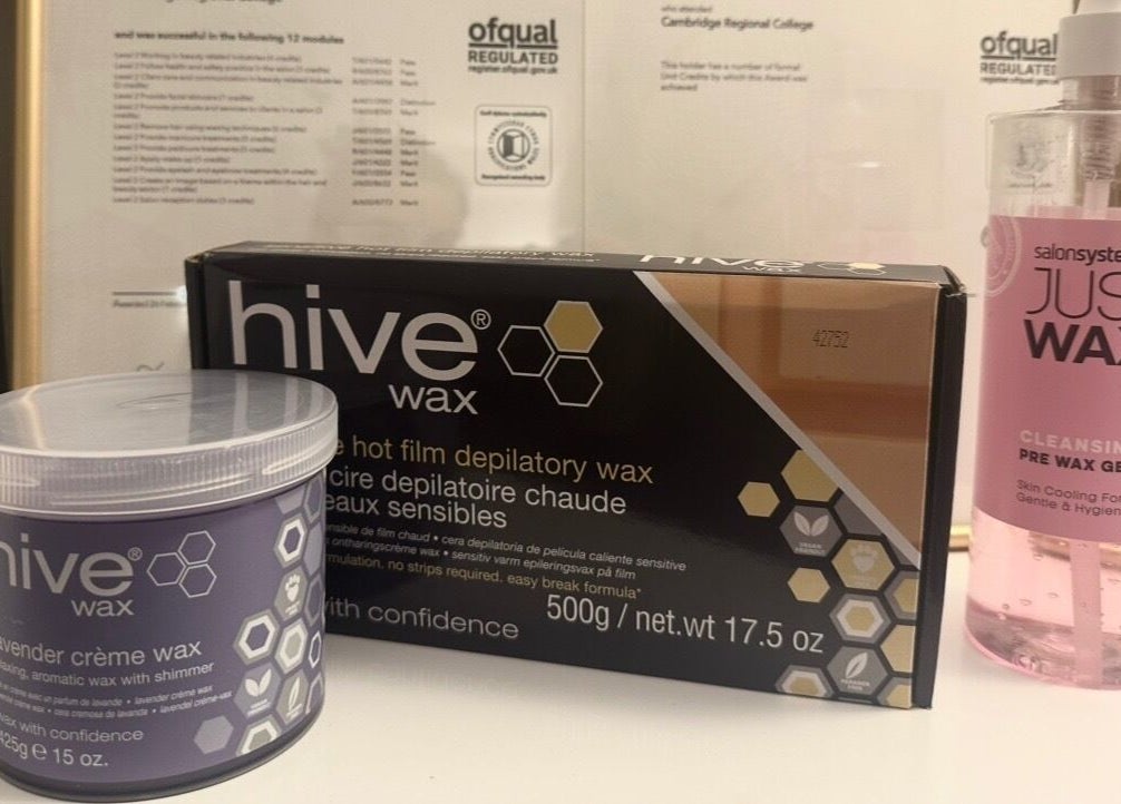 Cambridge Beautician / Mill Rd displays Hive and Just Wax products, Cambridge, England, GB. Professional waxing supplies.