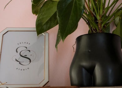 Elegant plant decor at Solare Studio in Gqeberha, Eastern Cape, ZA, showcasing creative ambiance.