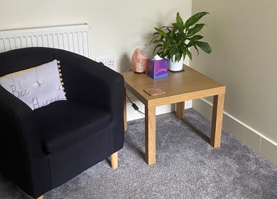 Relaxing chair with decor at Matter of Clarity, Finchampstead, England, GB. Perfect for wellness moments.