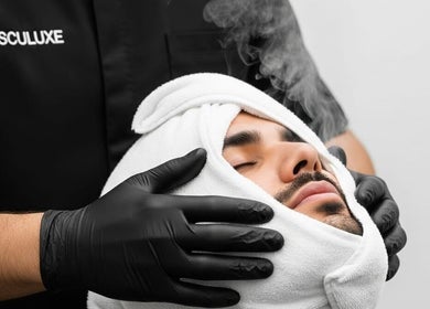 Steam facial treatment at Masculuxe Barbershop and Spa in Muscat, محافظة مسقط, OM, enhancing relaxation and wellness.