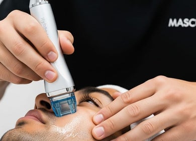 Facial treatment at Masculuxe Barbershop and Spa, مسقط, محافظة مسقط, OM. Close-up of advanced skincare service.