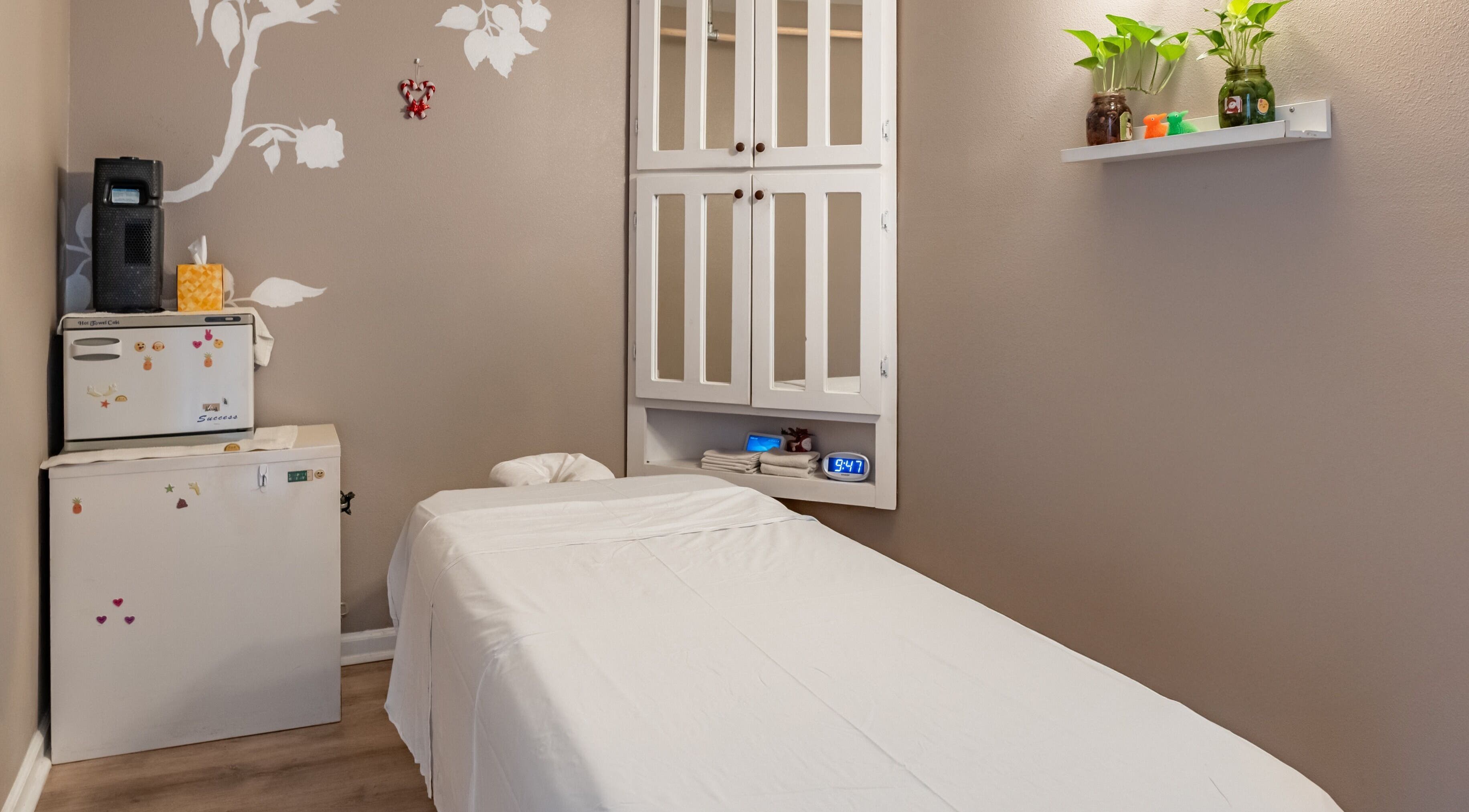 Cozy massage room at Massage One Wellness, South Pasadena, CA, US, with warm tones and calming decor.