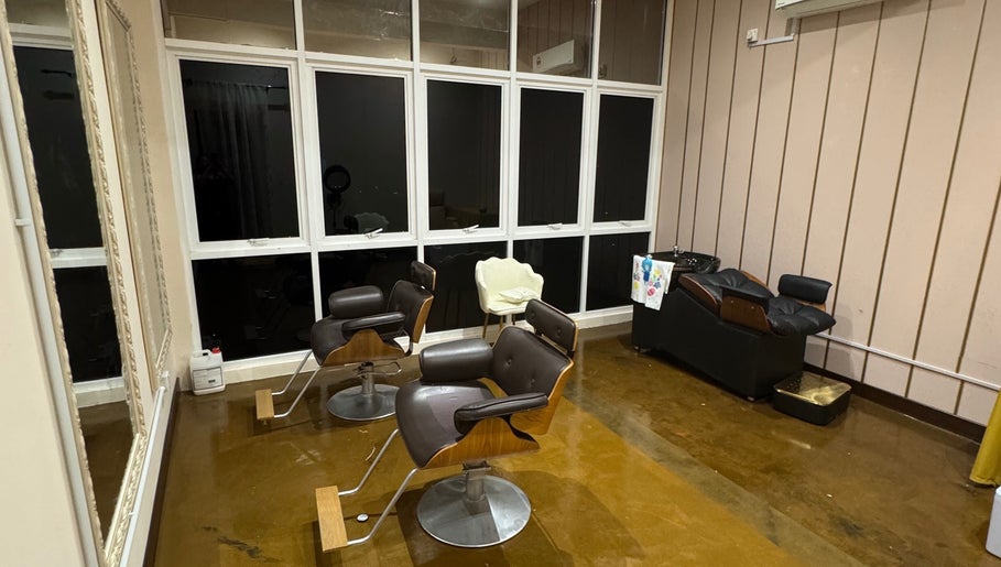 Modern salon chairs and washing station at Enchanté House of Beauty, Petaling Jaya, Selangor, MY.