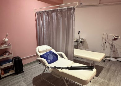 Relaxing treatment room at Enchanté House of Beauty, Petaling Jaya, Selangor, MY, featuring plush chairs.