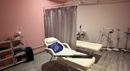 Relaxing treatment room at Enchanté House of Beauty, Petaling Jaya, Selangor, MY, featuring plush chairs.