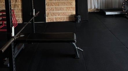 Fitness bench and barbell at Coachedbykarina, Catherine Field, New South Wales, AU gym.