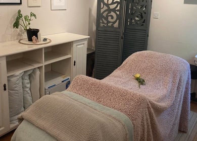 Relaxing massage bed setup at The Reflexology Cove - Danielle Lamb in Redruth, England, GB.