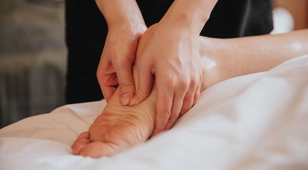 Foot massage at Main Avenue Spa - Home Service, Abu Dhabi, Abu Dhabi, AE, offering relaxation and wellness.