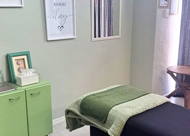Relaxing massage room at Lash Canvas, Cape Town, Western Cape, ZA, featuring a cozy treatment bed.