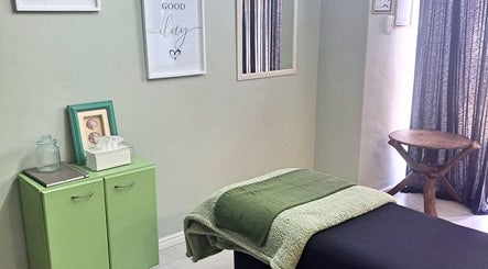 Relaxing massage room at Lash Canvas, Cape Town, Western Cape, ZA, featuring a cozy treatment bed.