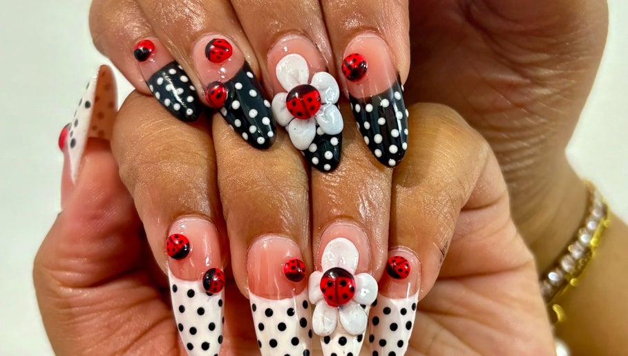 Intricate ladybug and polka dot nail art by NailsbyHashy in Malé City, Kaafu Atoll, MV.