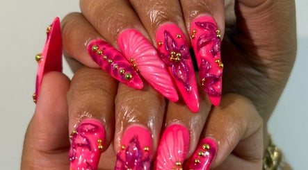 Vibrant pink floral nail art at NailsbyHashy in Malé City, Kaafu Atoll, MV.