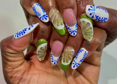 Colorful floral nail designs at NailsbyHashy in Malé City, Kaafu Atoll, MV, showcasing expert craftsmanship.