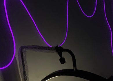 Relaxing purple lighting at Behind Her Eyes Lagos spa, Lagos, Lagos, NG creates a tranquil ambiance.