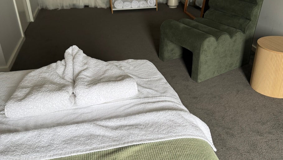 Cozy massage room at The Massage Room Braidwood, featuring fresh towels. Braidwood, New South Wales, AU.