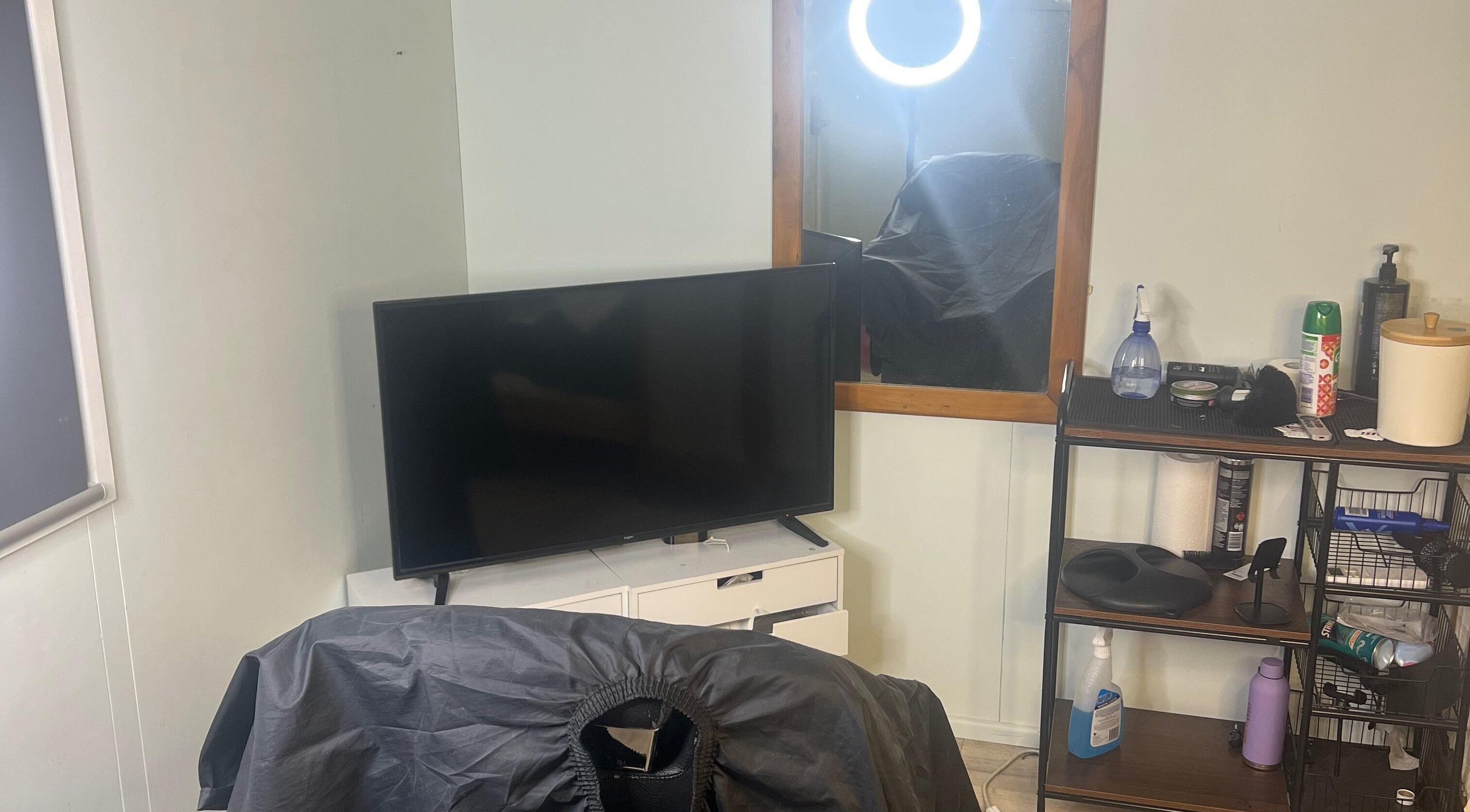 CutzBydori styling area featuring modern amenities in Isabella Plains, Australian Capital Territory, AU.