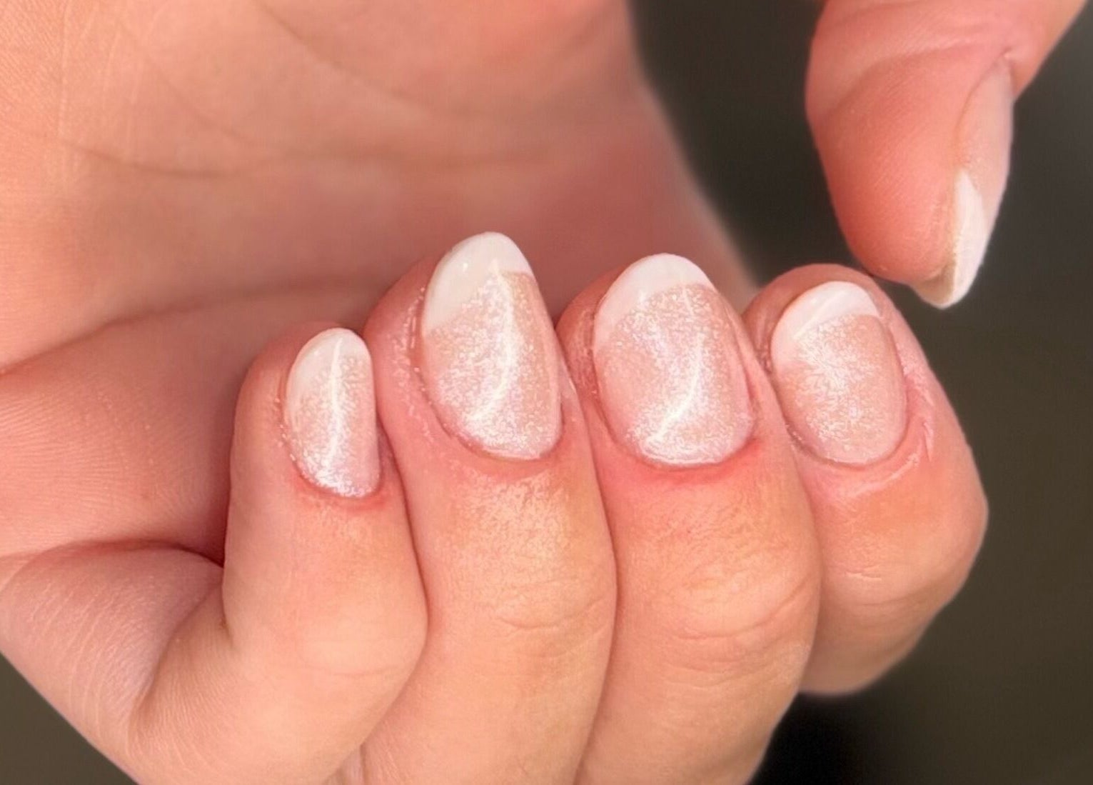 Close-up of shimmery manicured nails at Addy Artisan, Forres, Scotland, GB. Perfect for elegant looks.