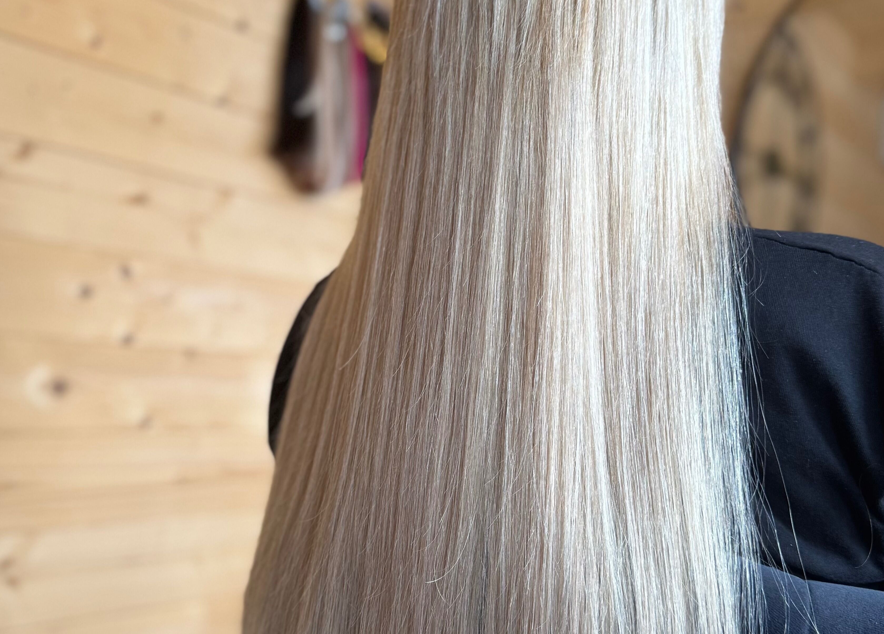 Elegant straight blonde hair styled at KB Hair, Winchester, England, GB.