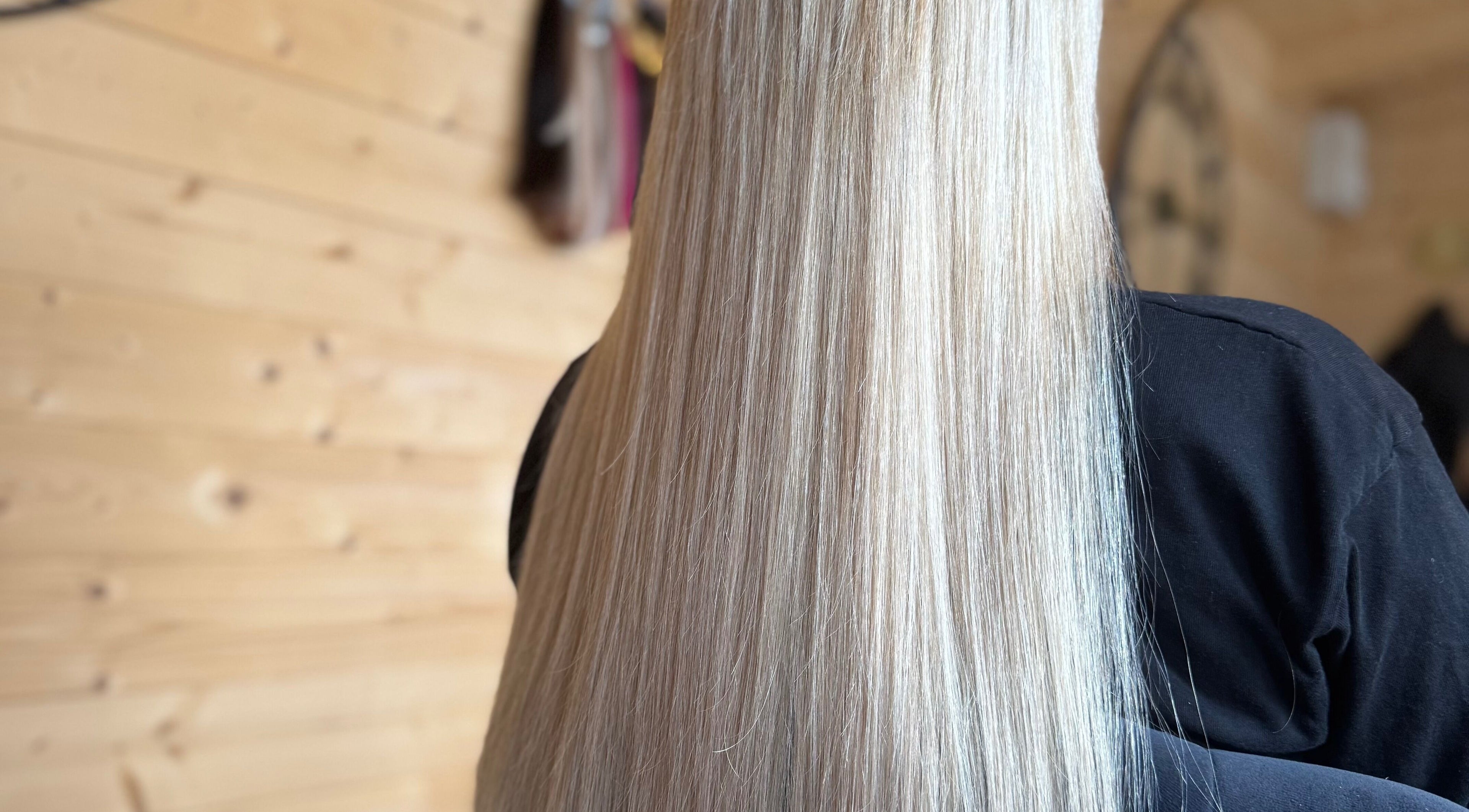 Elegant straight blonde hair styled at KB Hair, Winchester, England, GB.